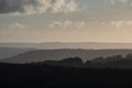 Stunning late Summer evening sunset with vibrant colours in South Downs National Park UK