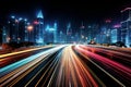 Stunning light streaks on busy highway under night sky captured in mesmerizing long exposure photo Royalty Free Stock Photo