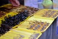 Stunning live scorpions are still alive as they are sold for food on small skewers near the Forbidden City, Beijing, , China