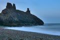 Stunning long exposure low ground close up view of seascape and Black Castle ruins South Quay Corporation Lands Co. Wicklow
