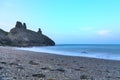 Stunning long exposure low ground view of seascape and Black Castle ruins South Quay Corporation Lands Co. Wicklow Ireland