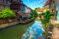 Stunning medieval colorful facades reflecting in water, Colmar, France, Europe Royalty Free Stock Photo