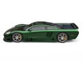 Stunning metallic dark green modern super car - side view Royalty Free Stock Photo