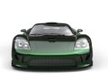 Stunning metallic dark green modern super concept car - front view closeup shot Royalty Free Stock Photo