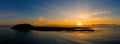 Stunning mid aspect aerial panoramic view of the early morning sunrise over the island of Lobos near Corralejo in Fuerteventura Royalty Free Stock Photo