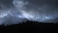 Stunning moody dramatic Winter landscape image of snowcapped Y Garn mountain in Snowdonia