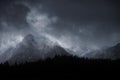 Stunning moody dramatic Winter landscape image of snowcapped Y Garn mountain in Snowdonia Royalty Free Stock Photo
