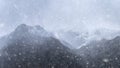 Stunning moody dramatic Winter landscape image of snowcapped Y Garn mountain in Snowdonia