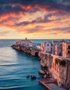 Stunning morning cityscape of Vieste - coastal town in Gargano National Park, Italy, Europe. Colorful summer sunrise on Adriatic s Royalty Free Stock Photo
