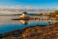 Stunning morning scenery of Oslofjord with small fisher house on rocky island. Oslo, Norway Royalty Free Stock Photo