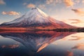 A stunning mountain with its magnificent reflection mirrored in the calm, glistening water, Volcanic mountain in the morning light