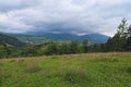 Stunning mountain landscape of Ukrainan Carpathian. View from the top of Volovets Pass. cloudy summer day Royalty Free Stock Photo