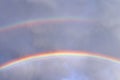 Stunning natural double rainbows plus supernumerary bows seen at a lake in northern germany Royalty Free Stock Photo