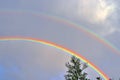 Stunning natural double rainbows plus supernumerary bows seen at a lake in northern germany Royalty Free Stock Photo