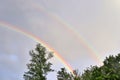 Stunning natural double rainbows plus supernumerary bows seen at a lake in northern germany Royalty Free Stock Photo