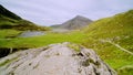 Stunning natural mountain landscape scenery of Cwm Idwal Lake in Glyderau range of Snowdonia Nation