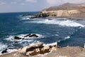 Stunning natural viewpoint with amazing cliffs and blue rough sea at north-west coast of Fuerteventura, Canary Islands, Spain