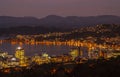 Stunning night view of Wellington, New Zealand, featuring the illuminated harbor. Royalty Free Stock Photo