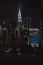 Stunning nighttime view of the modern downtown buildigns in Kuala Lumpur, Malaysia Royalty Free Stock Photo