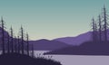 Stunning Panorama of the mountains in the morning is stunning from the riverbank with the silhouette of dry trees around