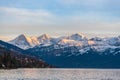 Stunning panorama view of famous Swiss Alps peaks on Bernese Oberland Eiger North Face, Monch, Jungfrau at sunset from Lake Thun