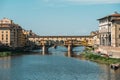 Stunning panoramic view of the bridge Ponte de Vecchio old bridge over the Arno River in Florence, Italy on sunny summer Royalty Free Stock Photo