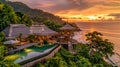 Stunning panoramic view of a luxury resort at sunset with ocean backdrop Royalty Free Stock Photo