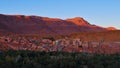 View over Tinghir, Morocco with historic loam Berber buildings located at a green oasis valley on the foothills of Atlas.