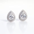 Stunning Pear-shaped Diamond Earrings In Peter Coulson Style Royalty Free Stock Photo