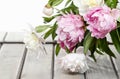 Stunning peonies in white wicker basket