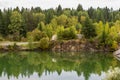 Stunning photo of fall foliage reflected on a lake with a glass like mirror water surface Royalty Free Stock Photo