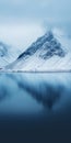 Serene Icelandic Mountains Reflected In Lake: A Light Indigo Snow Scene