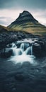 Dark And Moody Landscape: Waterfall In Front Of Mountain Royalty Free Stock Photo