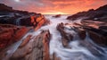 Dramatic Sunset on Rocky Coastline with Crashing Waves