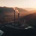 Industrial Sunrise: Smokestack and Mountains