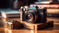 Vintage Camera and Film Rolls on Wooden Desk during Golden Hour