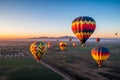 Colorful Hot Air Balloons Take Flight at Sunrise Royalty Free Stock Photo