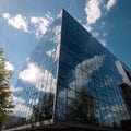 Modern Glass Office Building Reflecting Blue Sky Royalty Free Stock Photo