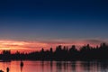 Beautiful pink sunset over water