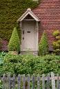 Stunning quintessential English country garden landscape in Spring in full colorful bloom