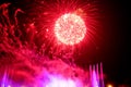 Stunning red fireworks ball exploding on the sky at night Royalty Free Stock Photo