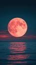 A Stunning Red Moon Reflection on Water at Sunset Royalty Free Stock Photo
