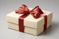 Stunning Red Ribbon Bow Tied Elegantly on a White Gift Box - Captivating Color Contrast