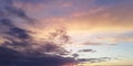 Stunning scenic backdrop. Multicolored clouds in the sunset sky. Light clouds contrast with dark clouds Royalty Free Stock Photo