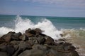 Stunning seascape featuring waves crashing against jagged rocks on a shoreline Royalty Free Stock Photo