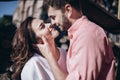 Stunning sensual outdoor portrait of young stylish fashion couple in love. Royalty Free Stock Photo