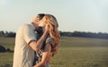 Stunning sensual young couple in love embracing at the sunset Royalty Free Stock Photo