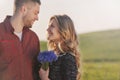 Stunning sensual young couple in love having fun in summer field Royalty Free Stock Photo