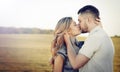 Stunning sensual young couple in love kissing at the sunset in s Royalty Free Stock Photo