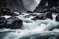 Raging Rapids in Rocky Cliffs: Moody and Rugged Lighting Royalty Free Stock Photo